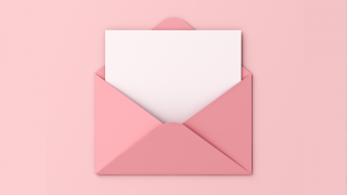 pink envelope on pink background